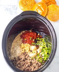 Shot of Slow Cooker Korean Beef Sloppy Joe ingredients in slow cooker