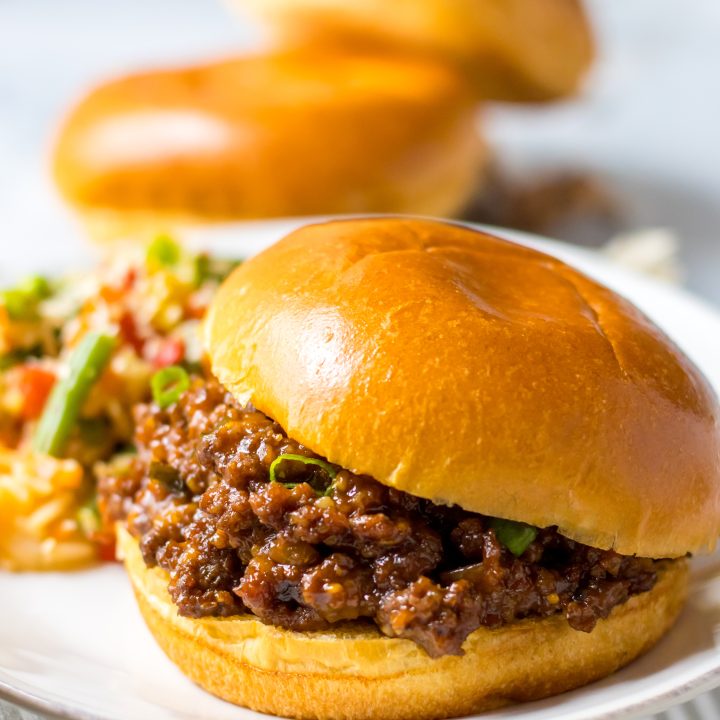 Close up of Slow Cooker Korean Sloppy Joes on shiny bun