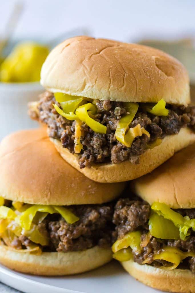 Slow Cooker Mississippi Sloppy Joes in slider bun being held