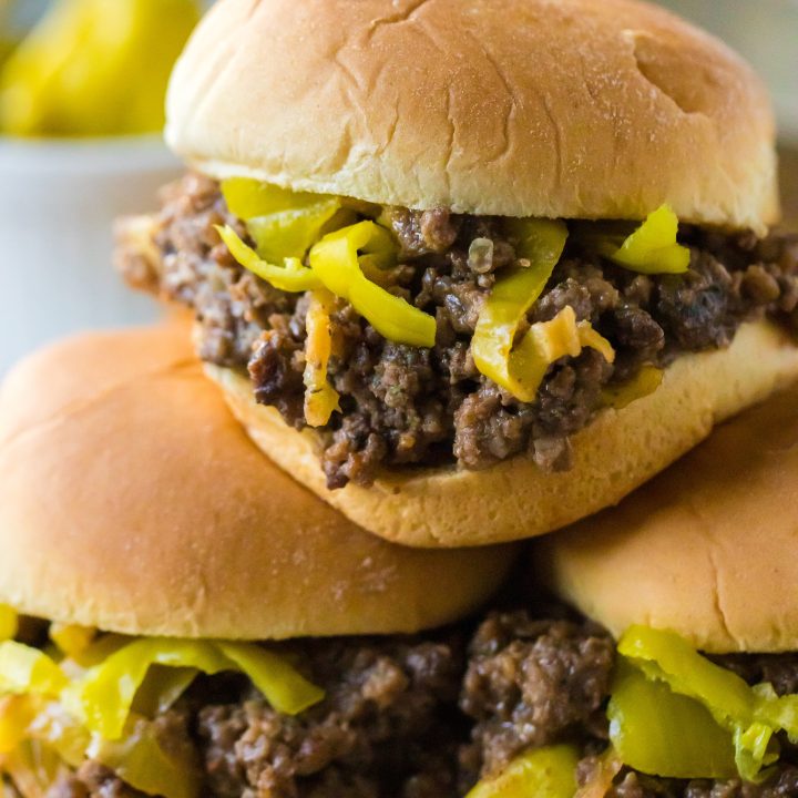 Slow Cooker Mississippi Sloppy Joes in slider bun being held