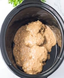 Slow Cooker Smothered Hamburgers uncooked in slow cooker