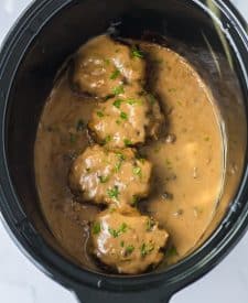 Slow Cooker Smothered Hamburgers cooked in slow cooker