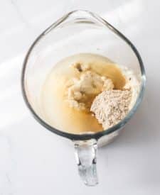 Slow Cooker Smothered Hamburgers gravy ingredients in glass bowl