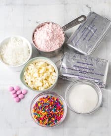 Bunny Butt Funfetti Dip ingredients, coconut, cake mix, cream cheese, sugar, sprinkles, white chocolate chips, m&ms