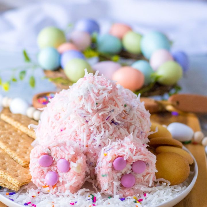 Close up shot of Bunny Butt Funfetti Dip on a plate with vanilla wafers and graham crackers around it
