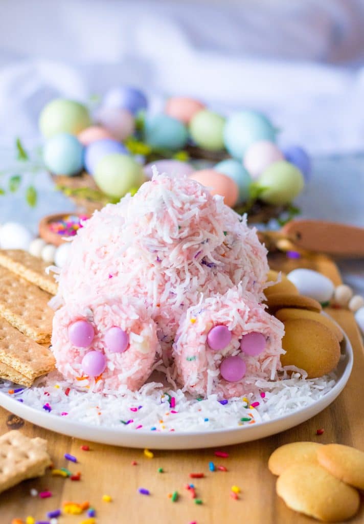 Close up shot of Bunny Butt Funfetti Dip on a plate with vanilla wafers and graham crackers around it