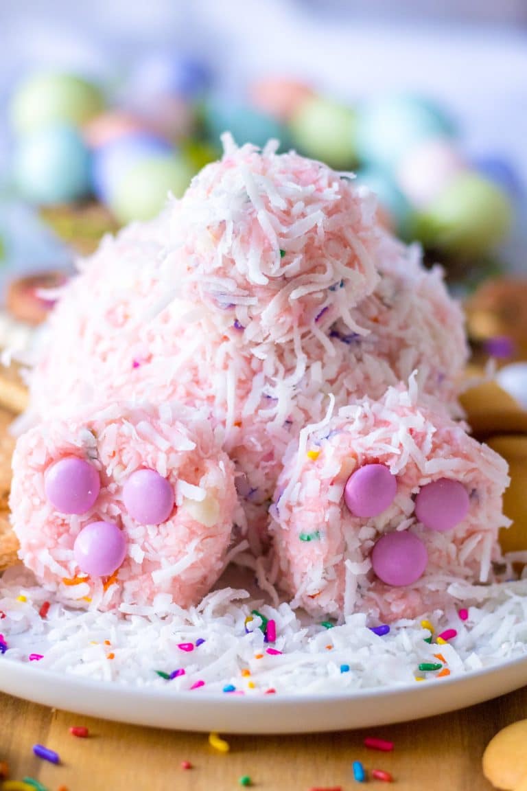 Close up shot of Bunny Butt Funfetti Dip on a plate with vanilla wafers and graham crackers around it