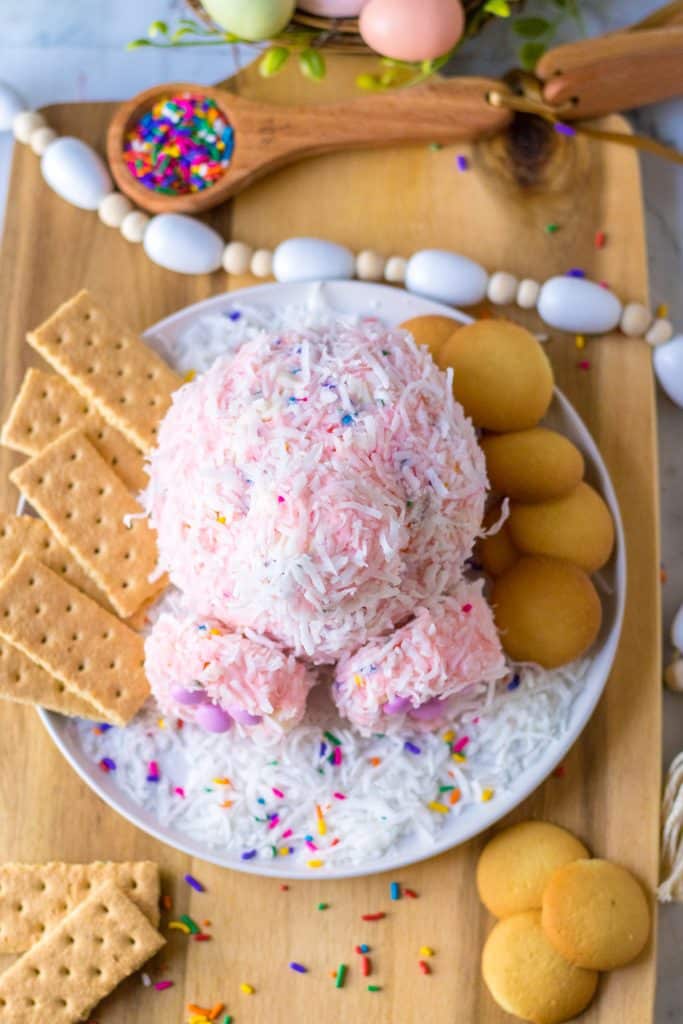 Close up shot of Bunny Butt Funfetti Dip on a plate with vanilla wafers and graham crackers around it