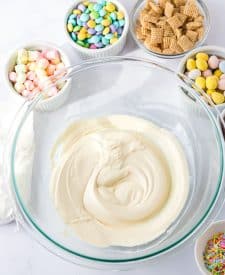 Process shot of bunny munch, melted almond bark in a bowl