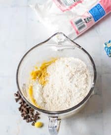 Easter Cookie Cake ingredients in mixing bowl with flour