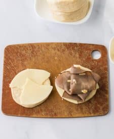Provolone and roast beef on biscuit dough