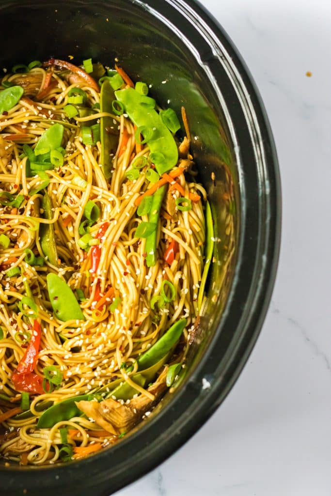 Slow Cooker Chicken Lo Mein with noodles in slow cooker