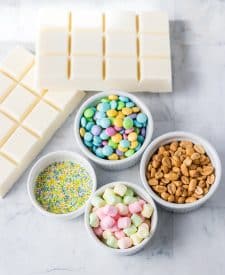 Slow Cooker Easter Candy Ingredients, white chocolate, peanuts, M&Ms, sprinkles, marshmallows