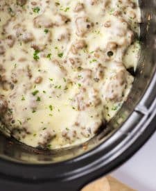 Slow Cooker French Dip Sloppy Joes in slow cooker with cheese melted