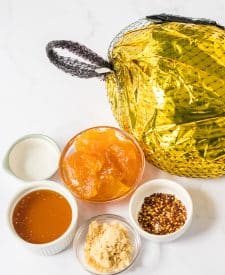 Ingredient shot of Slow Cooker Hot Honey Peach Glazed, ham, peach preserves, vinegar, honey, brown sugar and red pepper flakes