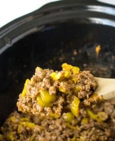 Slow Cooker Mississippi Sloppy Joes in slow cooker on spoon