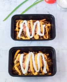 Copycat Taco Bell Nacho Supreme Fries and meat and nacho cheese and sour cream