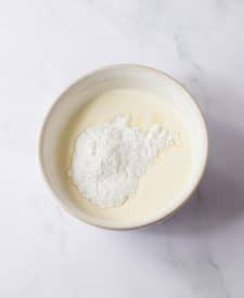 Key Lime Icebox Cake whipped topping mix in bowl