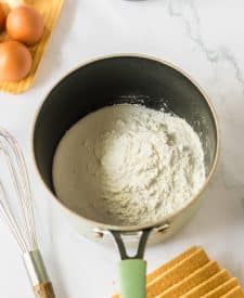 Key Lime Icebox Cake custard ingredients in pot