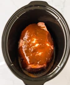 Slow Cooker BBQ Beef Sandwiches in slow cooker with bbq sauce
