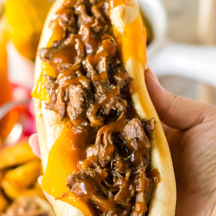 Slow Cooker BBQ Beef Sandwich held in hand