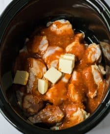 Slow Cooker Buffalo Ranch Chicken Wings uncooked in slow cooker