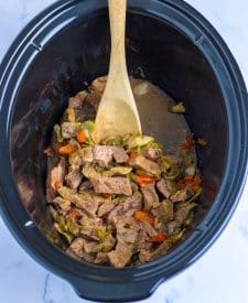 Slow Cooker Cheesesteak Quesadillas ingredients in slow cooker