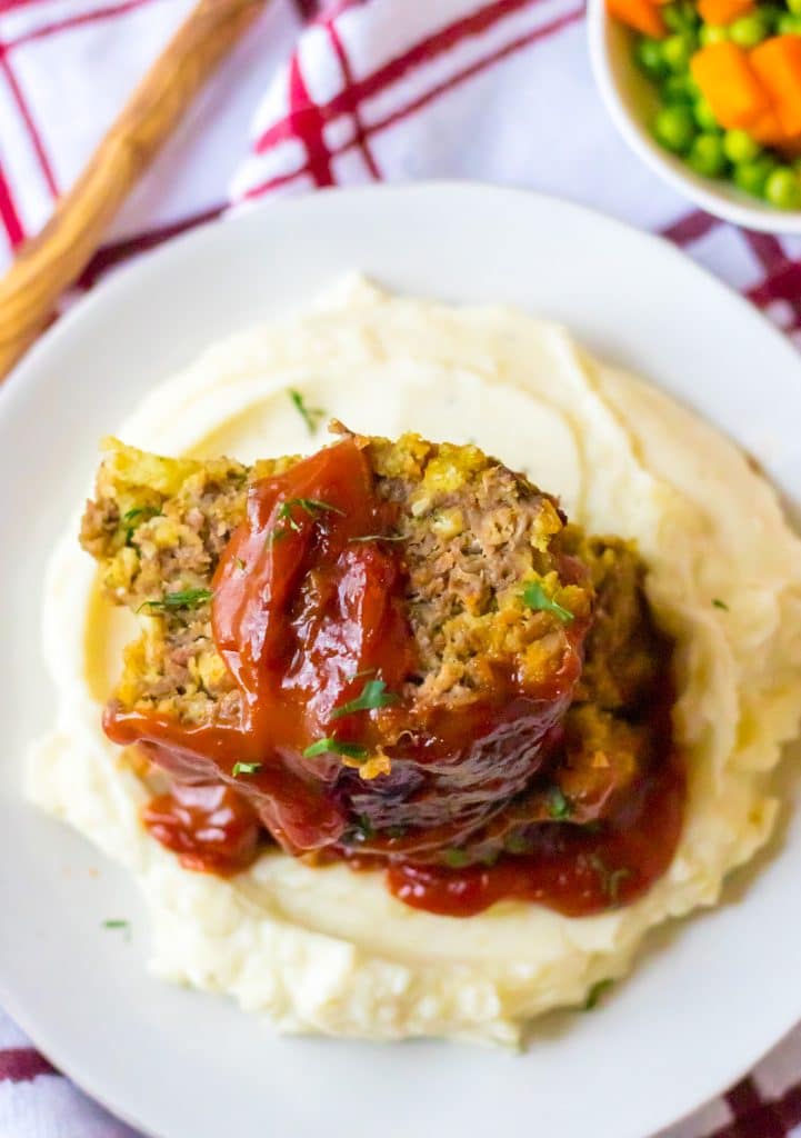Slow Cooker Easy Meatloaf piled on plate