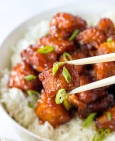 Slow Cooker Firecracker Chicken on chopsticks