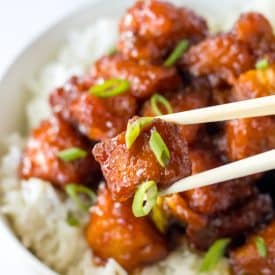 Slow Cooker Firecracker Chicken on chopsticks
