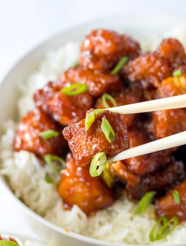 Slow Cooker Firecracker Chicken on chopsticks