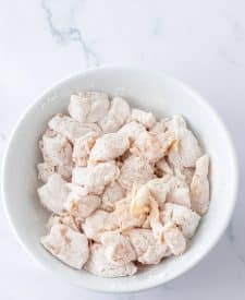 Slow Cooker Firecracker Chicken breaded in bowl