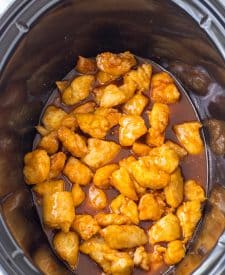 Slow Cooker Firecracker Chicken in slow cooker with sauce