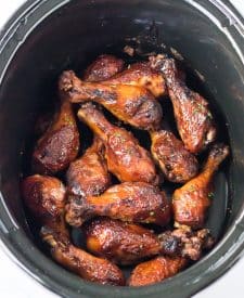 Slow Cooker Honey BBQ Drumsticks cooked in a slow cooker