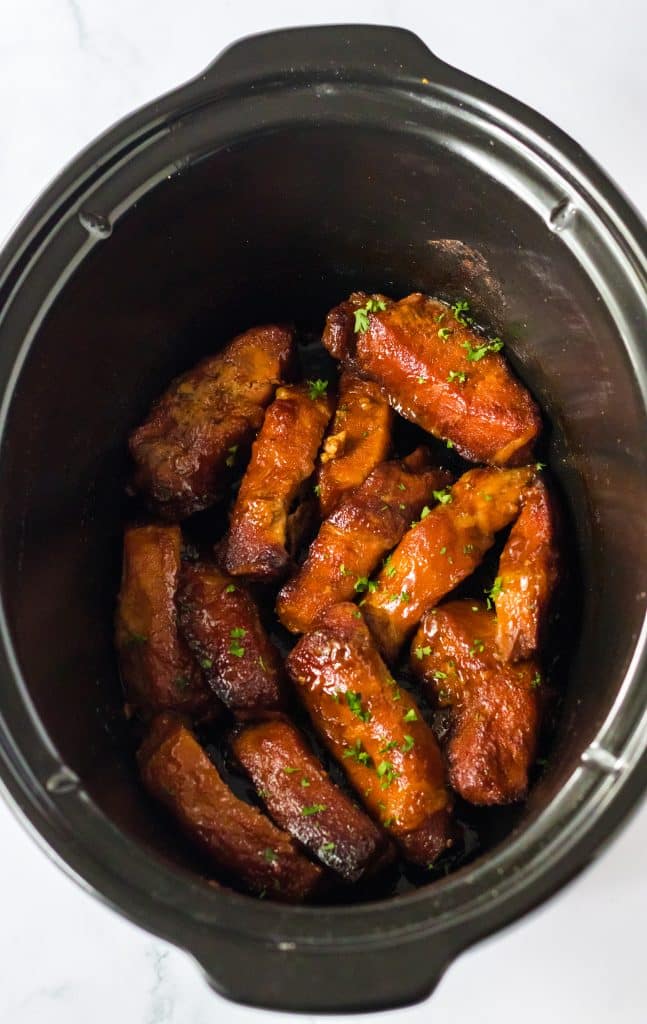 Slow Cooker Honey Peach Country Ribs cooked in slow cooker