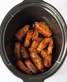 Slow Cooker Honey Peach Country Ribs finished in slow cooker