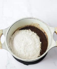 Copycat Cracker Barrel Double Fudge Coca Cola Cake frosting ingredients in pot