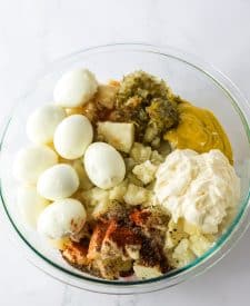 Deviled Egg Potato Salad ingredients in bowl