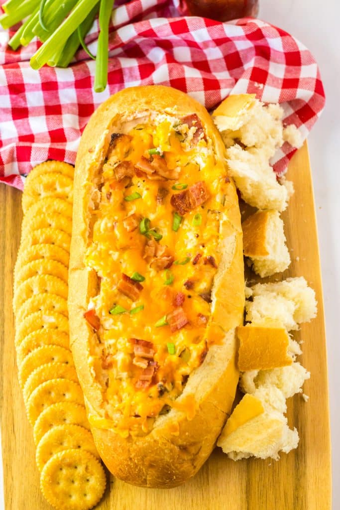 Mississippi Sin Dip on tray with crackers