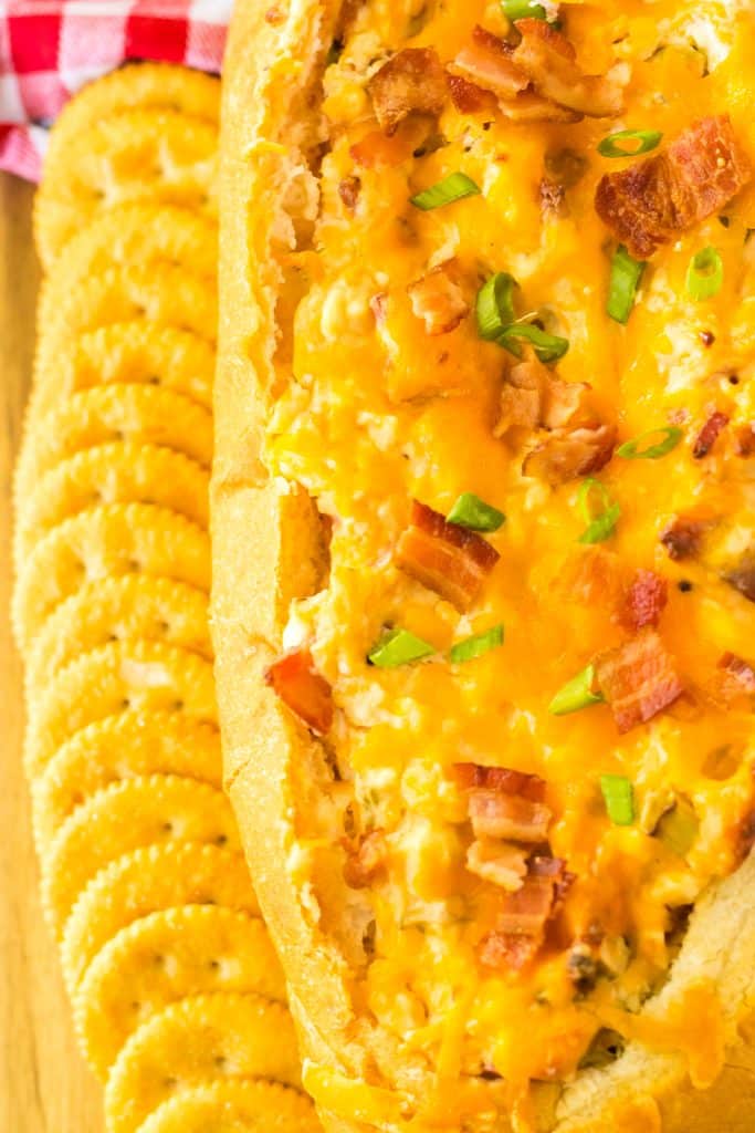 Mississippi Sin Dip on tray with crackers