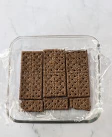 Peanut Butter Cup Icebox Cake graham crackers in pan