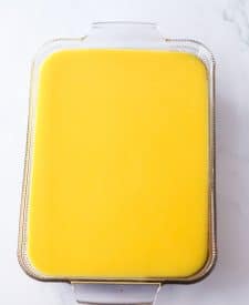 Pina Colada Cheesecake Bars pineapple layer in pan