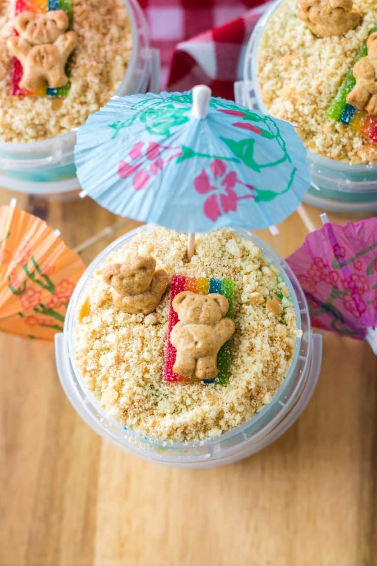 Sand Bucket Dessert over head shot with bear laying on candy towel