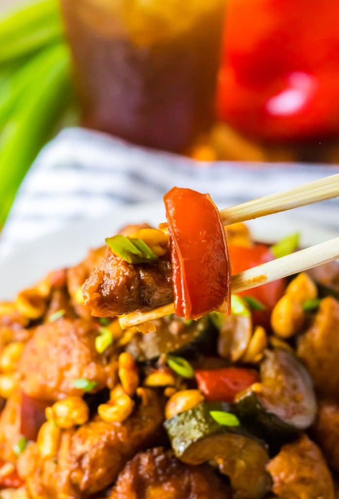 Slow Cooker Kung Pao Chicken in chopsticks