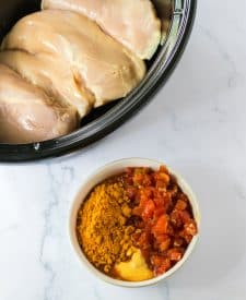 Slow Cooker Queso Chicken sauce ingredients in bowl