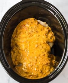 Slow Cooker Queso Chicken ingredients in slow cooker