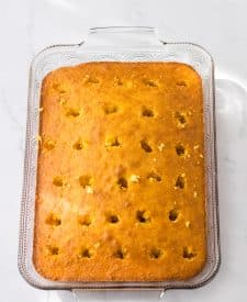 Ultimate Banana Pudding Poke Cake poked