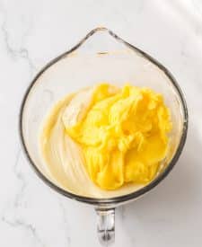 Ultimate Banana Pudding Poke Cake pudding in bowl