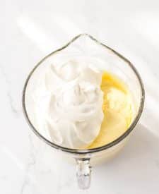 Ultimate Banana Pudding Poke Cake pudding in bowl