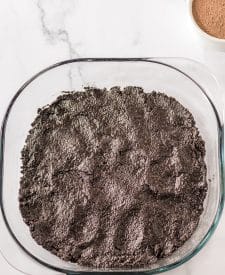 No Bake Butterfinger Lush chocolate crust in pan